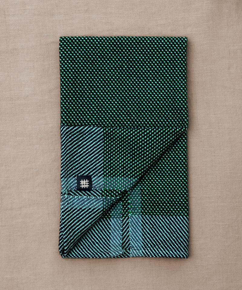 Green and blue handwoven towel for the bath or kitchen, made with American cotton.