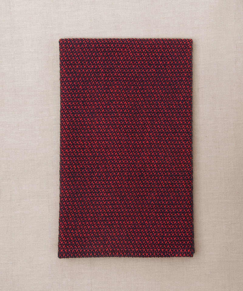 Red and navy handwoven towel for the bath or kitchen, made with American cotton.